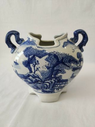 Chinese Blue And White Ceramic Footed Vase With Handle And Geometrical Mouth