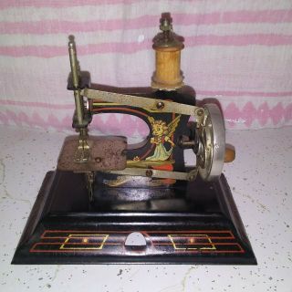 Vintage Casige Toy Sewing Machine 121,  Robin Hood And Angel Art,  Made In Germany