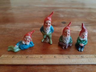 German 1950s Lead Gnome Set Of Four Lead Figure Gnomes.