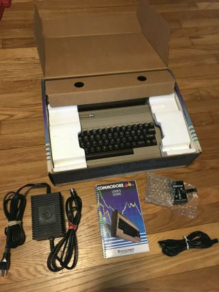 Vintage Commodore 64 computer including box,  accessories,  user guide 2