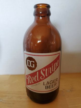 Vintage Dg Red Stripe Lager Beer Stubby Brown 12oz Bottle Jamaica W.  I.  Man Cave