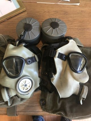 Two (2) Vintage Us Military M9a1 Field Protective Gas Mask With Canisters