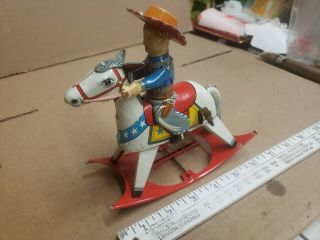 Vintage Tin Toy Wind Up Cow Boy On Horse Great.