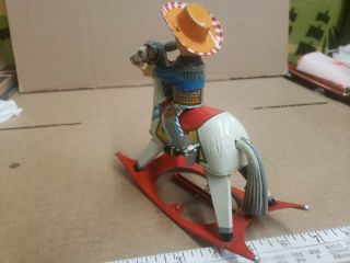 Vintage tin toy wind up cow boy on horse great. 3