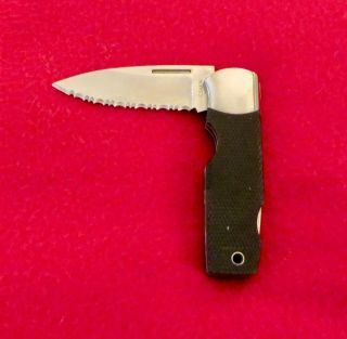 Vintage G Sakai Intrepid Folding Knife,  Serrated Blade,  Checkered Kraton Handle