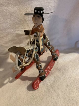 Folk Art By Delbert Buck Cowboy On A Rocking Horse