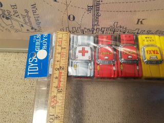 8 x Tin Toy Nomura TN Miniature Cars,  2 each of Ambulance Taxi Police Fire 3