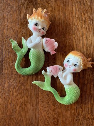 Vintage Ceramic Baby Mermaids Holding A Pink Fish Wall Plaque