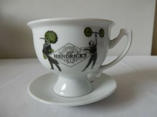 Attractive Hendrick’s Gin Cup And Saucer Birdman And Strongman Design