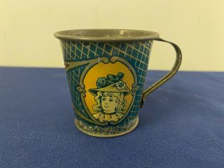Vintage Tin Lithograph Childs Toy Tea Cup With Girls Faces Pictured D