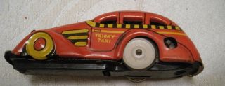 Marx Tricky Taxi Wind Up Tin Toy - Red Vintage Toy