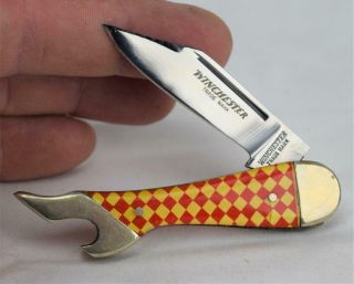 Winchester Trade Mark Red/yellow Checkerboard Lady Leg Knife Bottle Opener