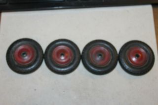 Set Of Four Vintage Wyandotte Rubber Truck Tires With Wood Rims
