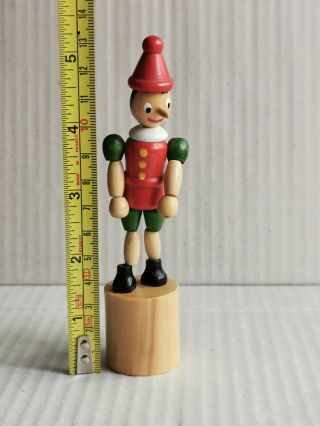 Wooden Pinocchio Push Button Puppet Movable Push - Up Toy With Beige Stand