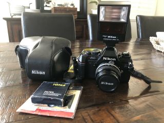 Vintage Nikon N2000 Camera With 50 Mm Lens And Flash With Accessories