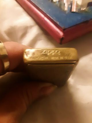 Brass Vintage Zippo Lighter Indian Head includes leather holder with camel on it 2