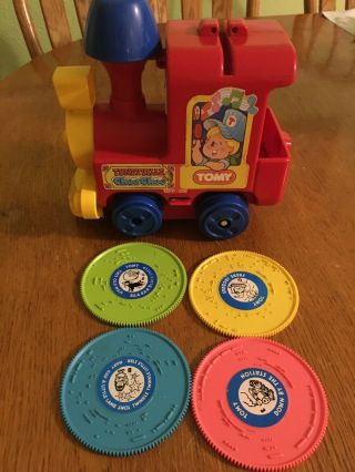 .  Vintage Tomy Tuneyville Choo Choo Train With 4 Records