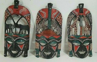 Three Wall Hanging Carved Wood Hand Painted Masks From Kenya With Tags