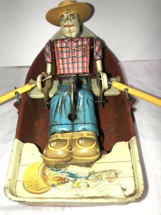 Vintage Tin Windup Toy Fisherman In Row Boat