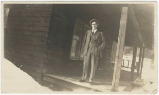 1930s Jaunty Young Man In Suit On Wooden Country Porch With Snow Snapshot