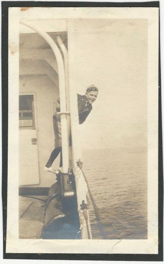 Boy Leans Over Railing On Boat Vintage Snapshot Ship Travel Transportation Water