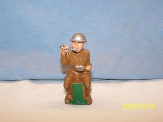 Vintage M84 Sitting Soldier Eating