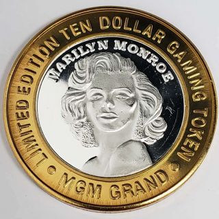 1997 Gdc Mgm Grand Casino.  999 Silver Strike $10 Marilyn Monroe Token Mgm9701