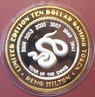 $10.  999 Silver Strike Casino Token.  Hilton,  Reno,  Nv.  Year Of The Snake.  Ss01.