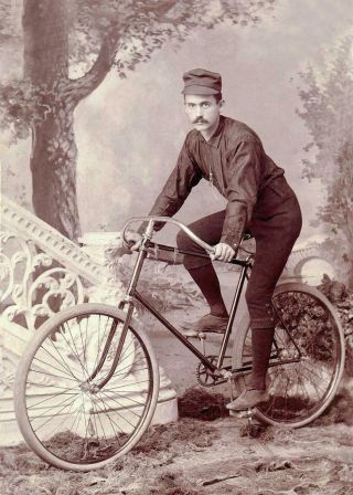 Antiqe Photo.  Man On Bicycle Early 1900s Studio Photo.  Photo Print 5x7