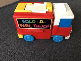 Vintage Tomy Japan Toy Fold - A - Fire Truck Transforms Open Push Button