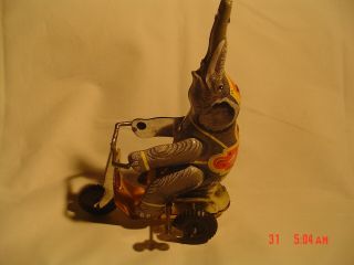 Vintage Tin Wind Up Circus Elephant On Tricycle