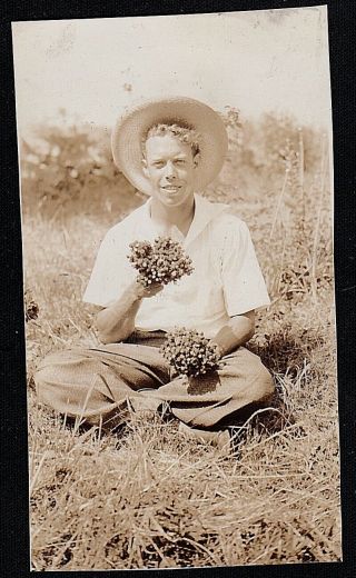 Vintage Antique Photograph Young Man Sitting On Ground With Flowers