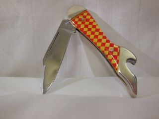 Winchester Trade Mark Red / Yellow Checkerboard Lady Leg Knife Bottle Opener
