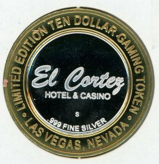. 999 Silver Strike $10 Token; El Cortez Casino,  Las Vegas - 7th Anniv.  - Red Cap