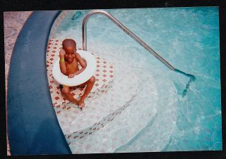 Vintage Photograph Cute Little African American Boy W/innertube Sitting In Water