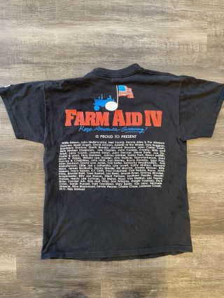 Vintage 1990 Farm Aid Concert T Shirt Willie Nelson,  Neil Young Faded Mens L