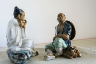 2 Vintage Chinese Shiwan Clay Mudman Figurine Playing Flute and Sitting with Axe 3