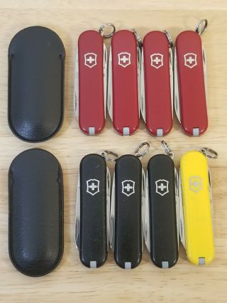 8 Victorinox Classic Sd 58mm Swiss Army Knives,  2 Pouches