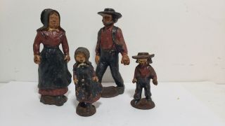 4 Pc Antique Cast Iron Figurines - Family - Man - Woman - Children - 2.  75in - 4.  75in - Patina