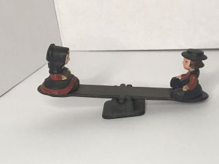 Vintage Cast Iron Amish Boy & Girl On Seesaw.  Teeter Totter Toys