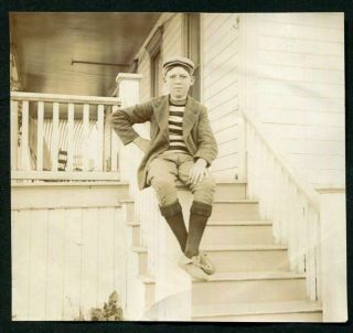 Cute Young Boy W Cap Jacket Long Socks Sitting On Porch - Antique Photo Snapshot