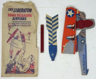 World War Ii Era Toy Airplane Liberator Bomb Releasing With
