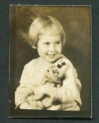 A Small Photobooth Photo Or Penny Arcade Photo Smiling Little Girl W Clown Toy