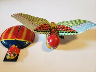 2 Vintage Tin Toys 1 Wind Up Bird And 1 Ladybug Clicker.  Yone,  Made In Japan.