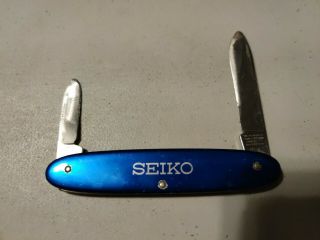 Vintage Seiko Watch Victorinox Swiss Army Pocket Knife Watch Case Back Opener