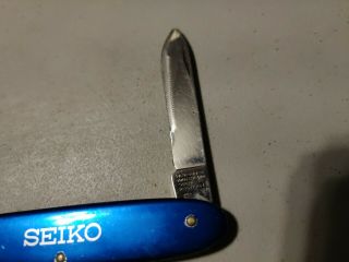 Vintage Seiko watch Victorinox swiss army pocket knife WATCH CASE BACK OPENER 2