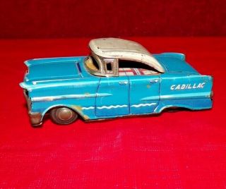 Vintage 4 1/2  Tin Friction Cadillac Car