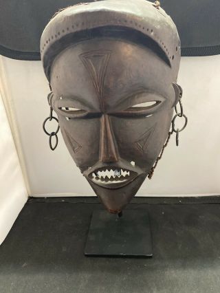 Vintage 13” Heavy Wood African Mask With Cut Out Teeth On Iron Stand