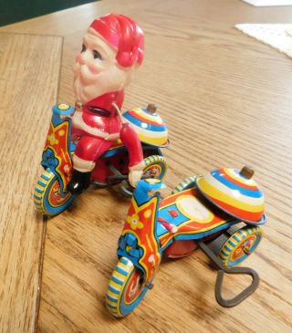 Two Vintage Tin,  Celluloid,  Santa Claus On Tricycle Toy,  Parts Or To Restore.