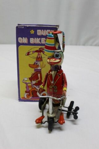 Vintage Duck On A Bike Wind Up Tin Toy W/ Spinning Fan Hat